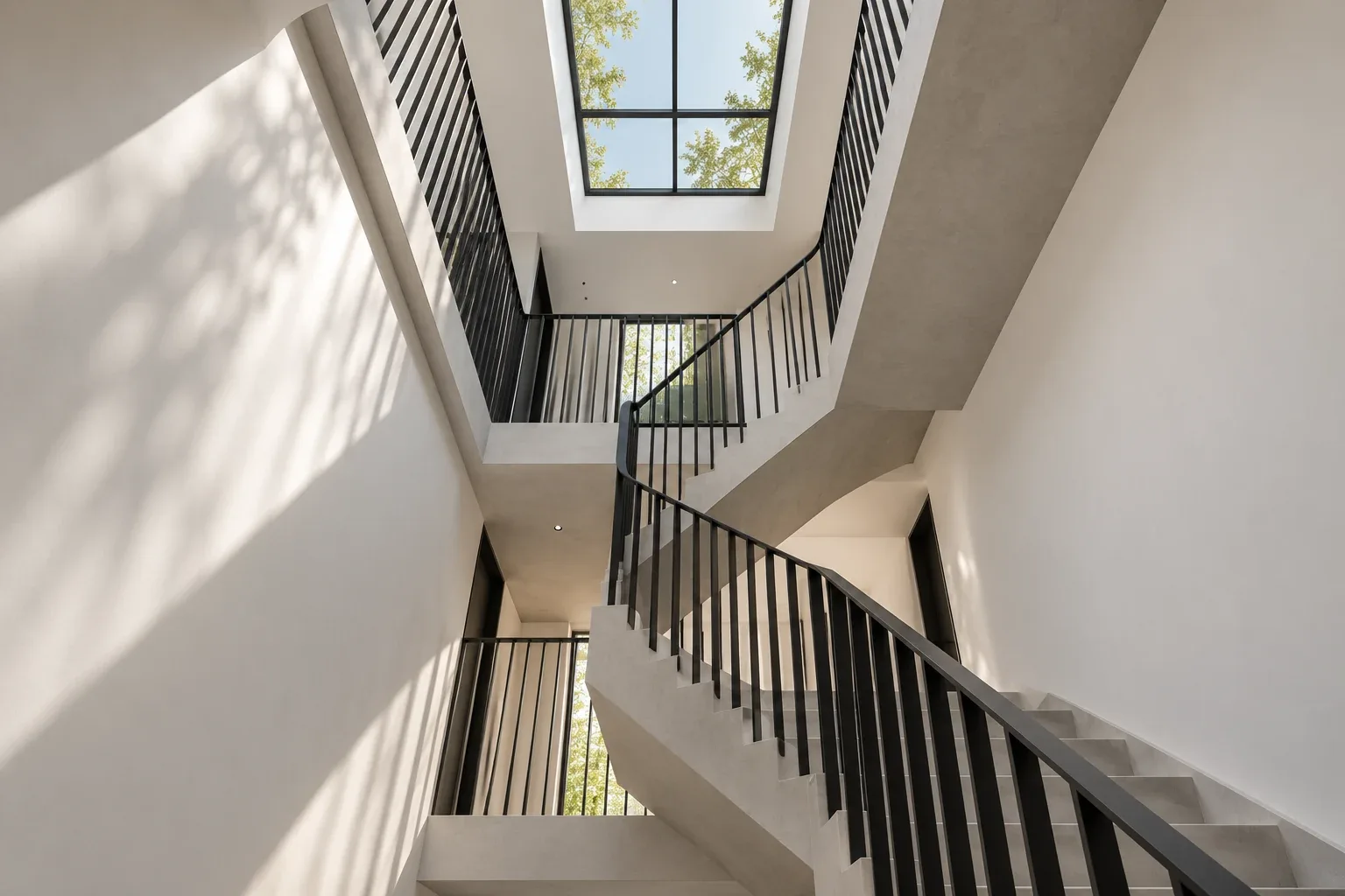 Daylight drawn through the central stair — MAISON NOIRE conceptual visualization